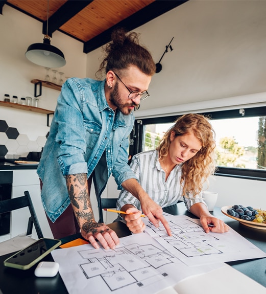 Couple reviewing plans for their HELOC home renovations