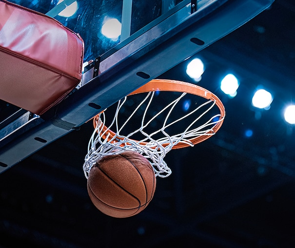 Close up of a basketball swish through the net