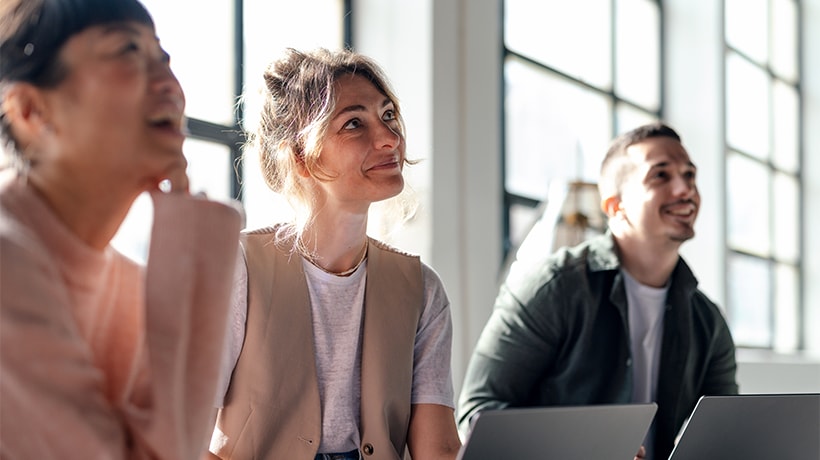 A young professional considering the benefits of refinancing her student loans.