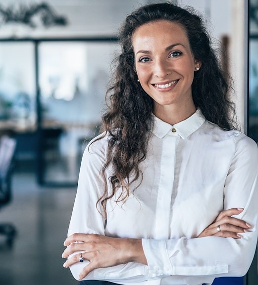 Smiling UCU employee in an office