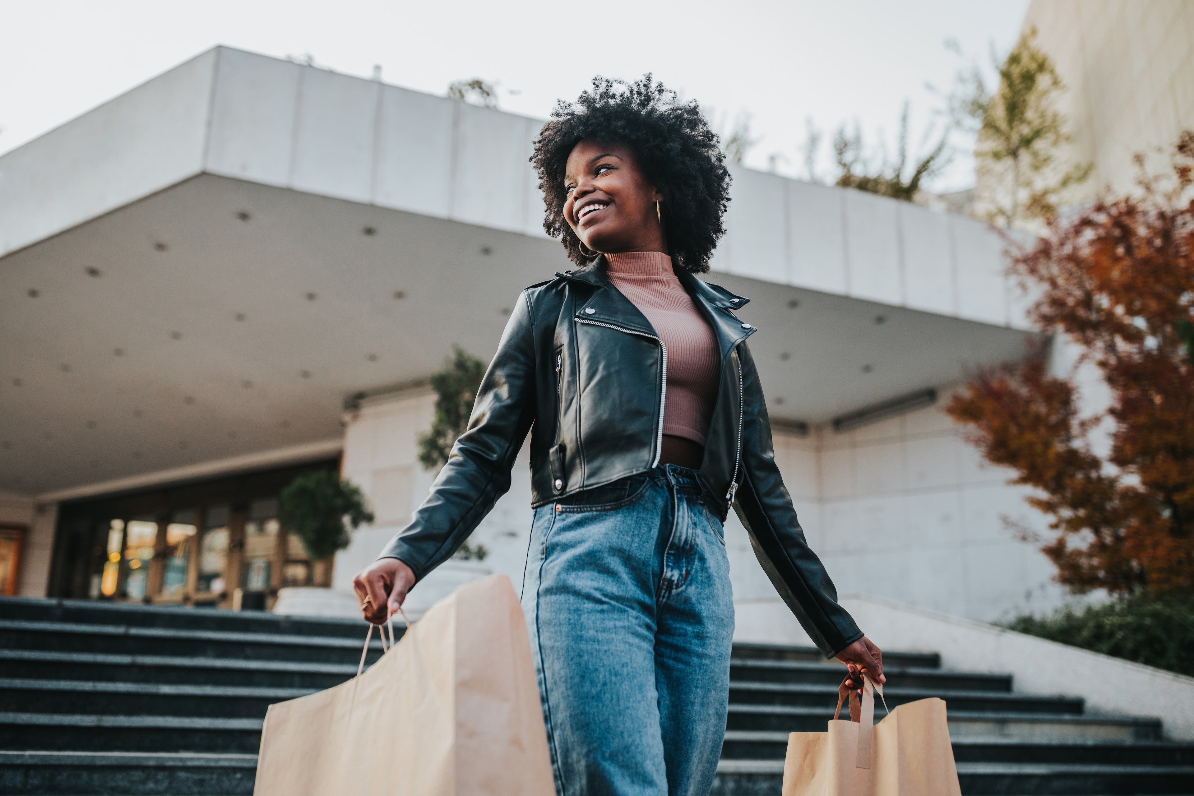 A woman holding shopping bags