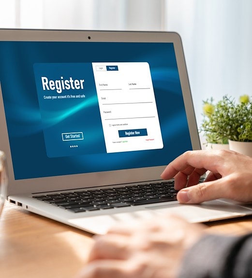 Close up view of a person on their laptop