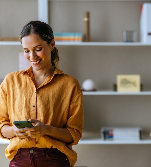 Woman checking UCU's rates on her phone