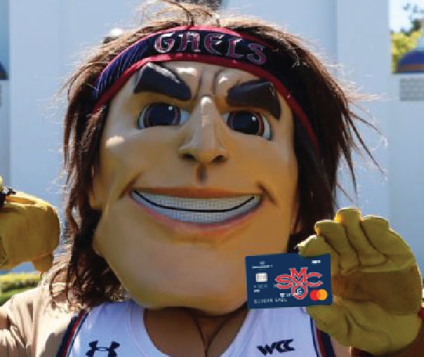 The SMC mascot holding up a UCU debit card