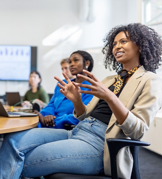 Business school student participating in a group discussion