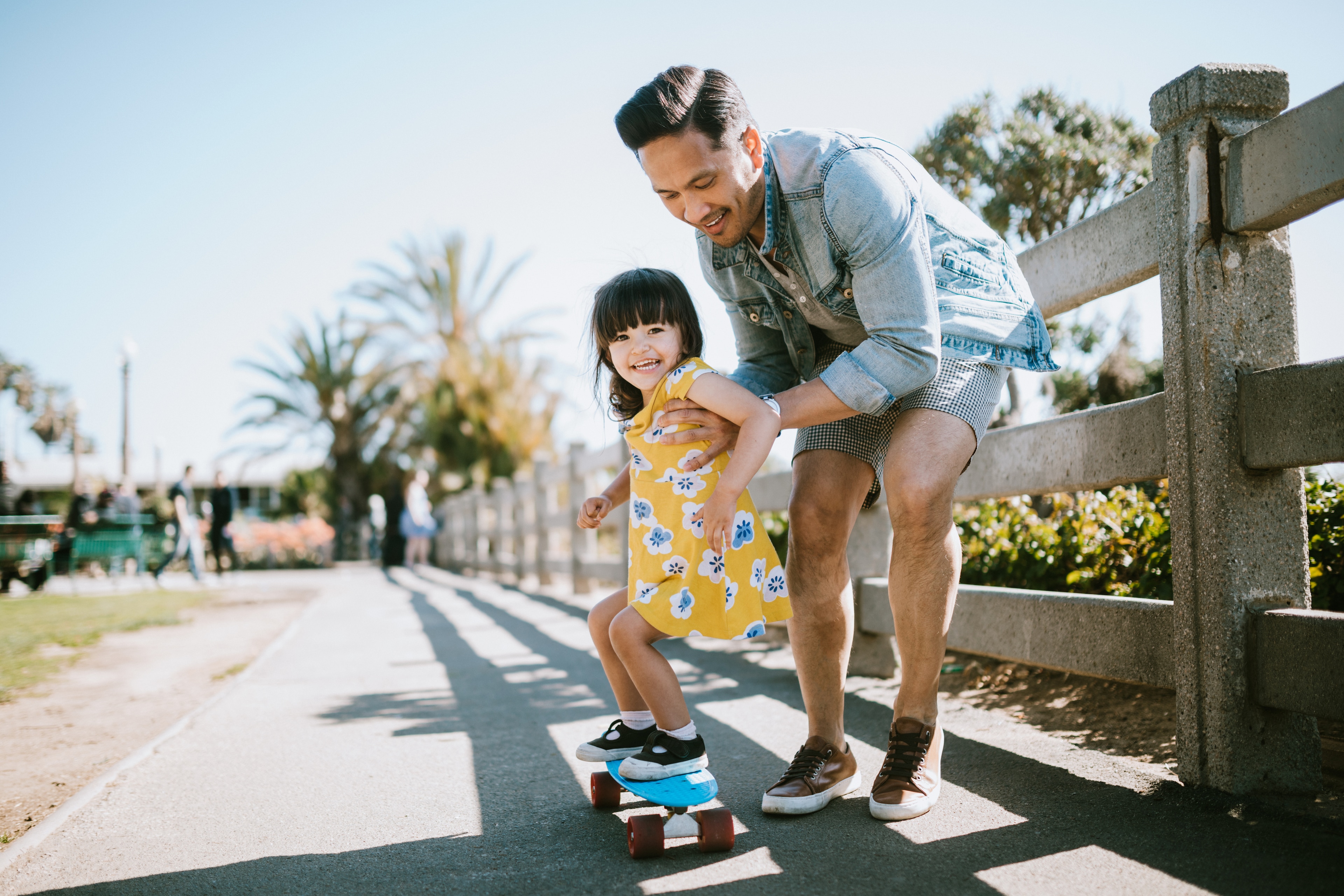 A man and child on a bench