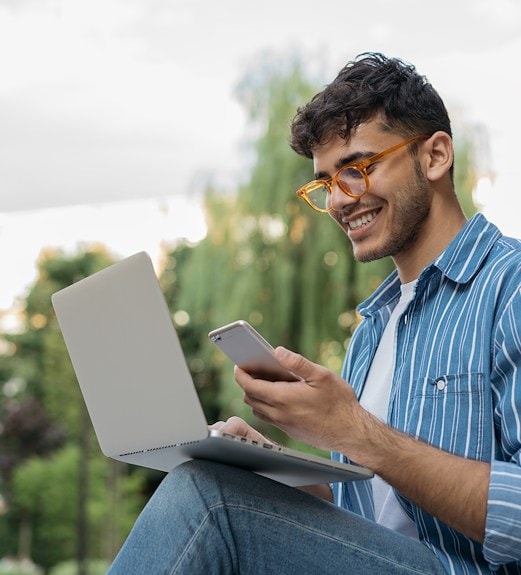College student applying for UCU membership on his laptop