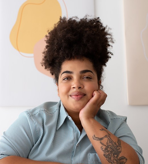 Young woman confidently staring forward at the camera