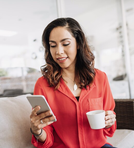 Woman viewing 24/7 digital banking on her phone
