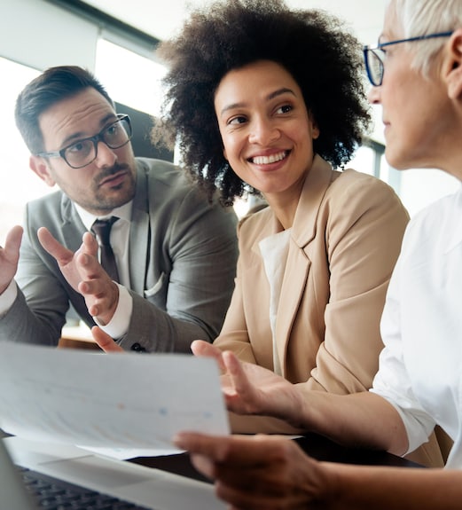 Group of professionals chatting together in a group